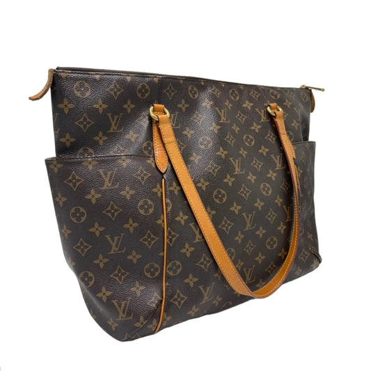 Louis Vuitton Totality Canvas Luxury Handbag